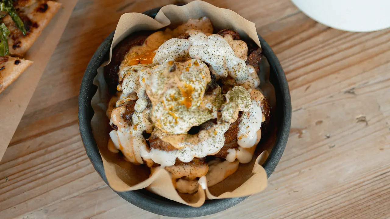 Andana's bravas: patató potatoes with light aioli and spicy tap de cortí paprika