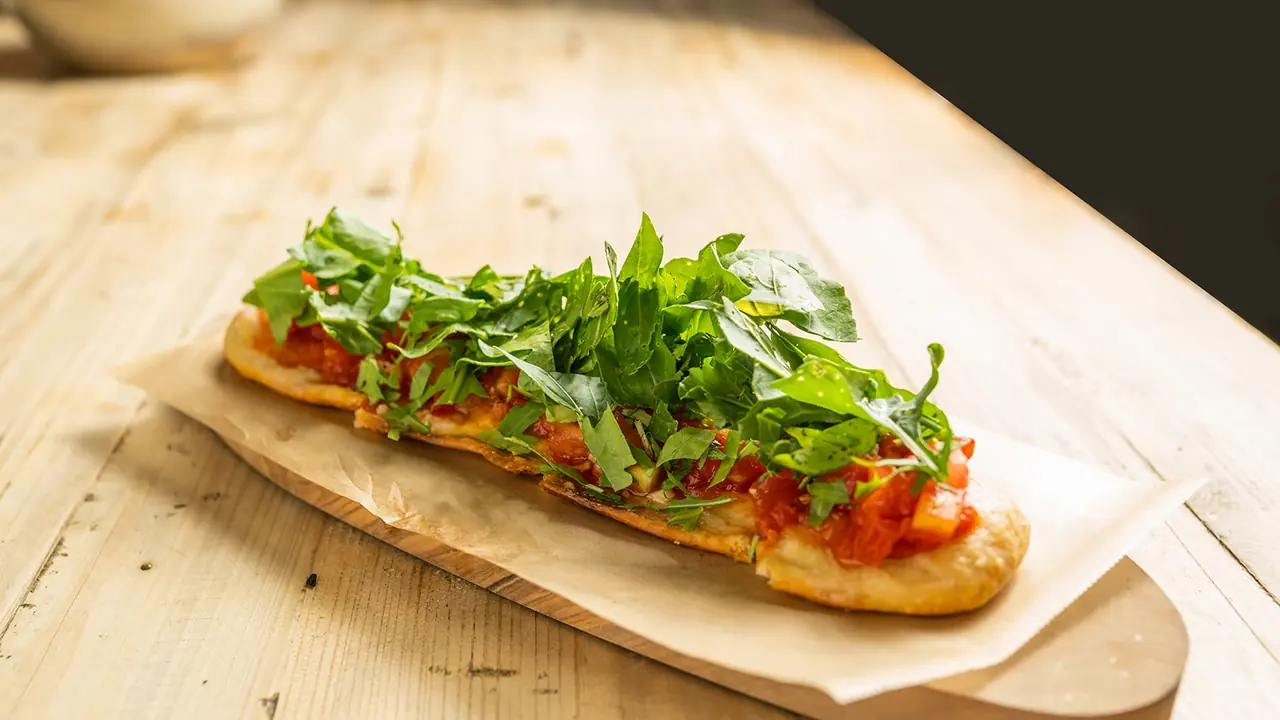 Mallorcan coca with tomato and rocket at Andana