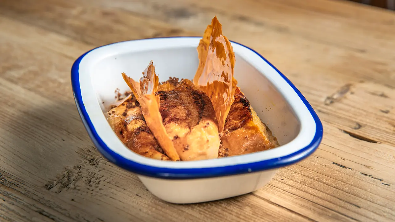 A homemade Andana dessert in its enamel dish